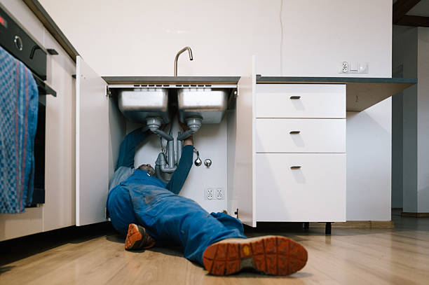Professional Emergency Plumber technician working in Paynesville, MN